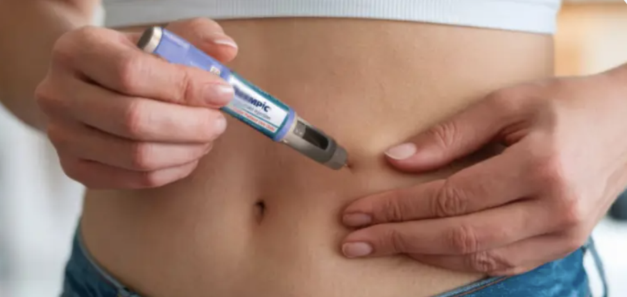 Nurse preparing a GLP-1 weight-loss injection